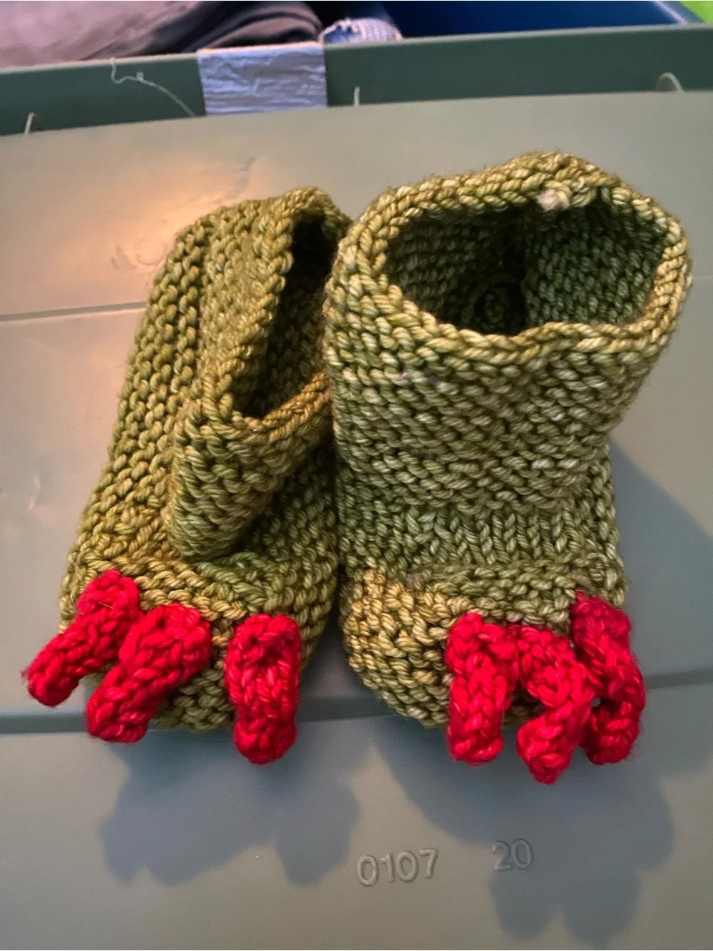 Hand-Knit Green Baby Booties with Red Claw Details